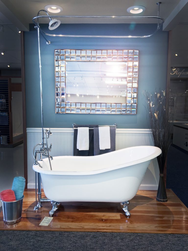 Showroom vintage clawfoot bathtub with sparkly mirror