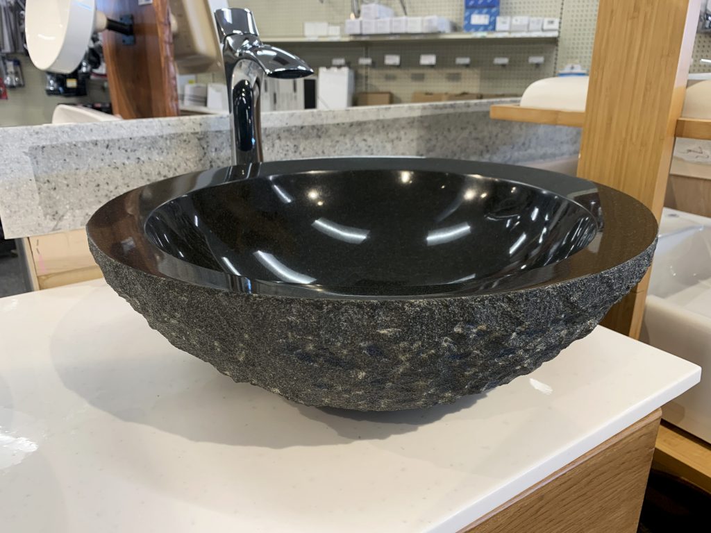 Black stone vessel sink